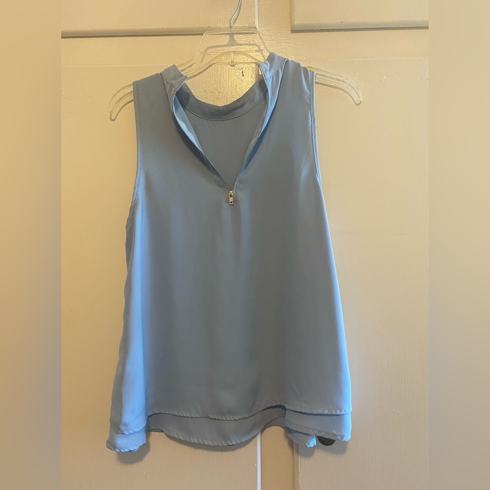 Light blue top
